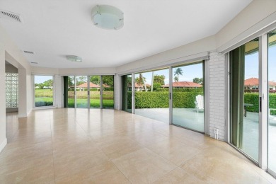 Waterfront Gem with Unmatched Golf & Lake Views!Discover the on Atlantis Golf Club in Florida - for sale on GolfHomes.com, golf home, golf lot