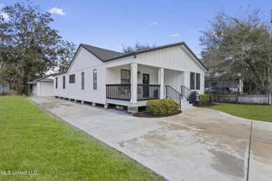 Welcome to 406 Russell Ave, a beautifully updated 3-bedroom on Gulf Hills Golf Club in Mississippi - for sale on GolfHomes.com, golf home, golf lot