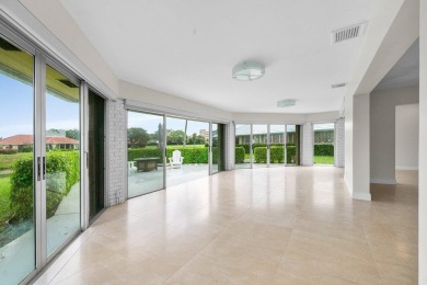 Waterfront Gem with Unmatched Golf & Lake Views!Discover the on Atlantis Golf Club in Florida - for sale on GolfHomes.com, golf home, golf lot