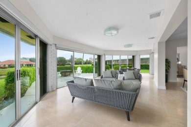 Waterfront Gem with Unmatched Golf & Lake Views!Discover the on Atlantis Golf Club in Florida - for sale on GolfHomes.com, golf home, golf lot