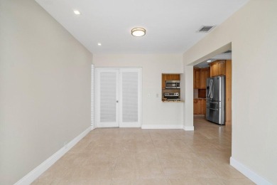 Waterfront Gem with Unmatched Golf & Lake Views!Discover the on Atlantis Golf Club in Florida - for sale on GolfHomes.com, golf home, golf lot