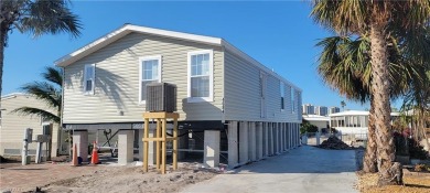 BRAND NEW CANAL FRONT JACOBSEN BUILT HOME on 0WNED LAND in a on Pelicans Nest Golf Club in Florida - for sale on GolfHomes.com, golf home, golf lot