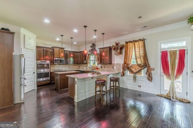 Welcome to 1405 Rainey Way - A Cul-de-Sac Gem in Crystal Lake on Crystal Lake Golf and Country Club in Georgia - for sale on GolfHomes.com, golf home, golf lot