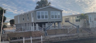 BRAND NEW CANAL FRONT JACOBSEN BUILT HOME on 0WNED LAND in a on Pelicans Nest Golf Club in Florida - for sale on GolfHomes.com, golf home, golf lot