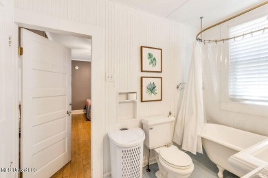 MUST SEE this charming Old Town Bay St Louis cottage with pool! on The Bridges Golf Club At Hollywood Casino in Mississippi - for sale on GolfHomes.com, golf home, golf lot