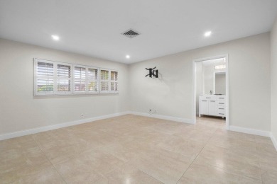 Waterfront Gem with Unmatched Golf & Lake Views!Discover the on Atlantis Golf Club in Florida - for sale on GolfHomes.com, golf home, golf lot