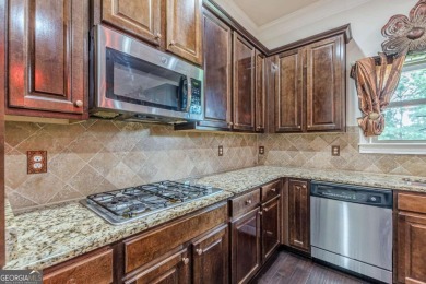 Welcome to 1405 Rainey Way - A Cul-de-Sac Gem in Crystal Lake on Crystal Lake Golf and Country Club in Georgia - for sale on GolfHomes.com, golf home, golf lot