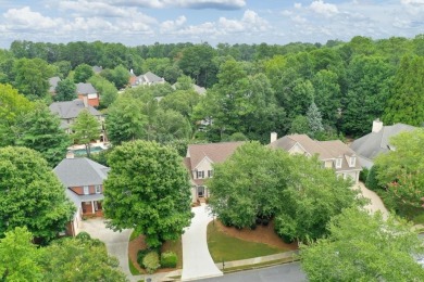 This beautifully maintained home in the Gleneagles neighborhood on The Golf Club of Georgia in Georgia - for sale on GolfHomes.com, golf home, golf lot