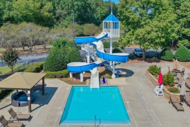This beautifully maintained home in the Gleneagles neighborhood on The Golf Club of Georgia in Georgia - for sale on GolfHomes.com, golf home, golf lot