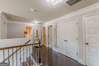 Welcome to 1405 Rainey Way - A Cul-de-Sac Gem in Crystal Lake on Crystal Lake Golf and Country Club in Georgia - for sale on GolfHomes.com, golf home, golf lot
