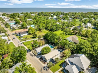 MUST SEE this charming Old Town Bay St Louis cottage with pool! on The Bridges Golf Club At Hollywood Casino in Mississippi - for sale on GolfHomes.com, golf home, golf lot