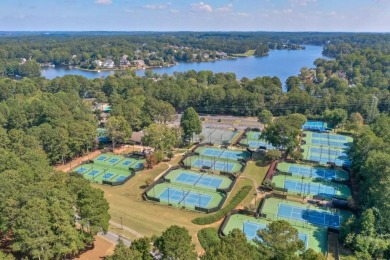 This beautifully maintained home in the Gleneagles neighborhood on The Golf Club of Georgia in Georgia - for sale on GolfHomes.com, golf home, golf lot