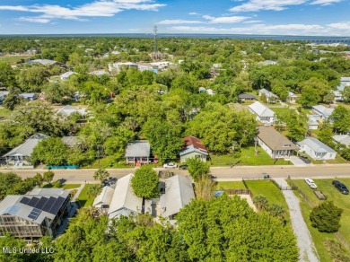 MUST SEE this charming Old Town Bay St Louis cottage with pool! on The Bridges Golf Club At Hollywood Casino in Mississippi - for sale on GolfHomes.com, golf home, golf lot