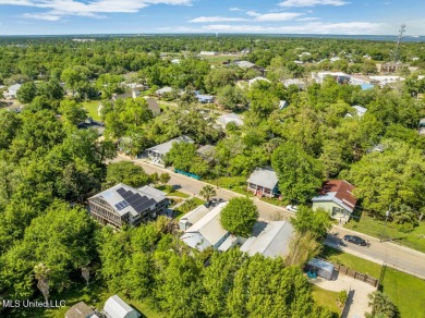 MUST SEE this charming Old Town Bay St Louis cottage with pool! on The Bridges Golf Club At Hollywood Casino in Mississippi - for sale on GolfHomes.com, golf home, golf lot