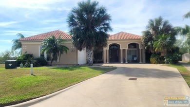 Make this home YOUR retreat on a quiet cut-de-sac in the gated on South Padre Island Golf Club in Texas - for sale on GolfHomes.com, golf home, golf lot
