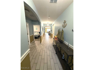 Located within the Magnolia Landing community, this residence on Herons Glen Golf and Country Club in Florida - for sale on GolfHomes.com, golf home, golf lot