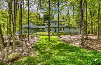 This 5-bedroom, 4.5-bath Colonial-style home offers 3,500 square on Whiteface Club and Resort in New York - for sale on GolfHomes.com, golf home, golf lot