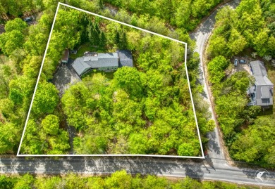 This 5-bedroom, 4.5-bath Colonial-style home offers 3,500 square on Whiteface Club and Resort in New York - for sale on GolfHomes.com, golf home, golf lot