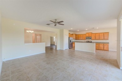 Want to live like you've retired to the house of your dreams on The Oasis Club at Champions Gate in Florida - for sale on GolfHomes.com, golf home, golf lot