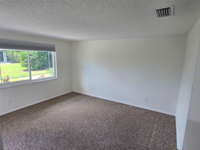 One or more photo(s) has been virtually staged. Carefree Living on Seven Springs Golf and Country Club in Florida - for sale on GolfHomes.com, golf home, golf lot