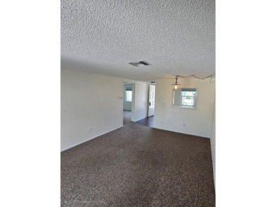 One or more photo(s) has been virtually staged. Carefree Living on Seven Springs Golf and Country Club in Florida - for sale on GolfHomes.com, golf home, golf lot