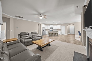 This elegant ranch-style home is located in the highly coveted on Olde Liberty Golf and Country Club in North Carolina - for sale on GolfHomes.com, golf home, golf lot