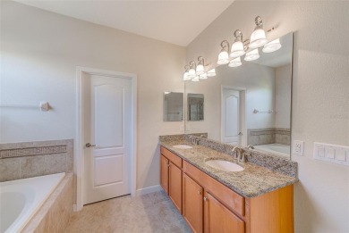 Want to live like you've retired to the house of your dreams on The Oasis Club at Champions Gate in Florida - for sale on GolfHomes.com, golf home, golf lot