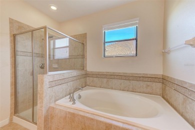 Want to live like you've retired to the house of your dreams on The Oasis Club at Champions Gate in Florida - for sale on GolfHomes.com, golf home, golf lot
