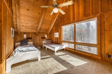 Adorable Cabin in the woods with red line behind the house and on Tannenbaum Golf Club in Arkansas - for sale on GolfHomes.com, golf home, golf lot