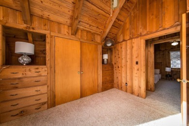 Adorable Cabin in the woods with red line behind the house and on Tannenbaum Golf Club in Arkansas - for sale on GolfHomes.com, golf home, golf lot