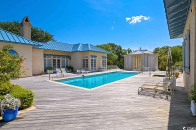 Aesthetically and architecturally, *1210 DeBordieu Blvd.* is on DeBordieu Country Club in South Carolina - for sale on GolfHomes.com, golf home, golf lot