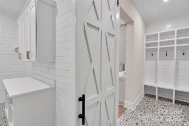 Stunning 2020 custom-built home located in The Palisades. This on The Palisades Country Club in North Carolina - for sale on GolfHomes.com, golf home, golf lot