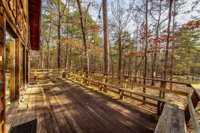 Adorable Cabin in the woods with red line behind the house and on Tannenbaum Golf Club in Arkansas - for sale on GolfHomes.com, golf home, golf lot