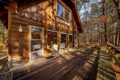 Adorable Cabin in the woods with red line behind the house and on Tannenbaum Golf Club in Arkansas - for sale on GolfHomes.com, golf home, golf lot