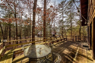 Adorable Cabin in the woods with red line behind the house and on Tannenbaum Golf Club in Arkansas - for sale on GolfHomes.com, golf home, golf lot