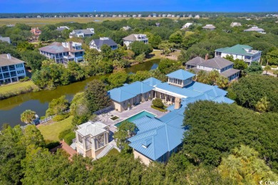 Aesthetically and architecturally, *1210 DeBordieu Blvd.* is on DeBordieu Country Club in South Carolina - for sale on GolfHomes.com, golf home, golf lot