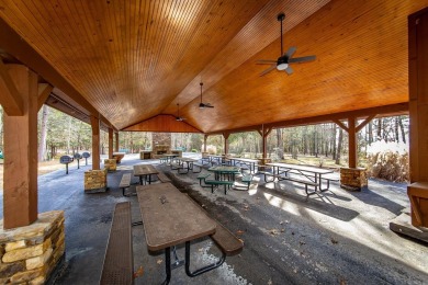 Adorable Cabin in the woods with red line behind the house and on Tannenbaum Golf Club in Arkansas - for sale on GolfHomes.com, golf home, golf lot