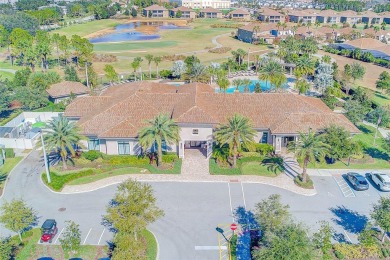 Want to live like you've retired to the house of your dreams on The Oasis Club at Champions Gate in Florida - for sale on GolfHomes.com, golf home, golf lot