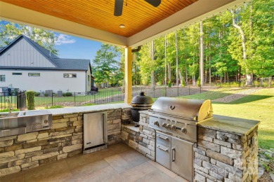Stunning 2020 custom-built home located in The Palisades. This on The Palisades Country Club in North Carolina - for sale on GolfHomes.com, golf home, golf lot