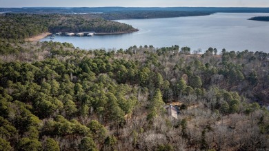 Adorable Cabin in the woods with red line behind the house and on Tannenbaum Golf Club in Arkansas - for sale on GolfHomes.com, golf home, golf lot