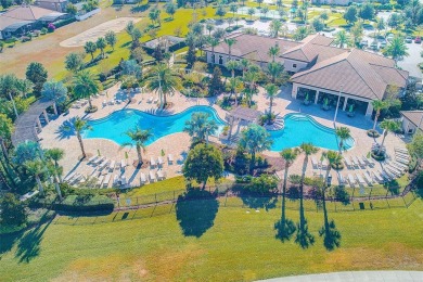 Want to live like you've retired to the house of your dreams on The Oasis Club at Champions Gate in Florida - for sale on GolfHomes.com, golf home, golf lot