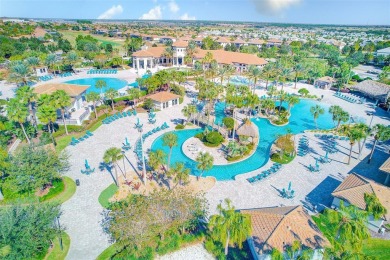 Want to live like you've retired to the house of your dreams on The Oasis Club at Champions Gate in Florida - for sale on GolfHomes.com, golf home, golf lot