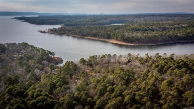 Adorable Cabin in the woods with red line behind the house and on Tannenbaum Golf Club in Arkansas - for sale on GolfHomes.com, golf home, golf lot