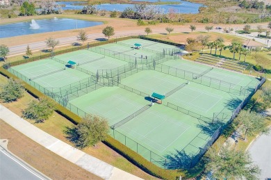 Want to live like you've retired to the house of your dreams on The Oasis Club at Champions Gate in Florida - for sale on GolfHomes.com, golf home, golf lot
