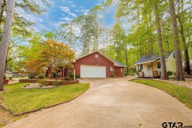 Welcome to this Traditional Red Brick home located on a highly on Hide-A-Way Lake Golf Course in Texas - for sale on GolfHomes.com, golf home, golf lot