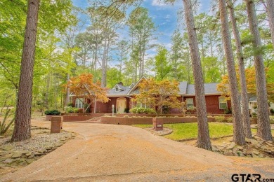 Welcome to this Traditional Red Brick home located on a highly on Hide-A-Way Lake Golf Course in Texas - for sale on GolfHomes.com, golf home, golf lot