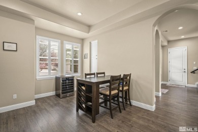 Nestled in a gated Somersett community, this charming home on Somersett Country Club in Nevada - for sale on GolfHomes.com, golf home, golf lot