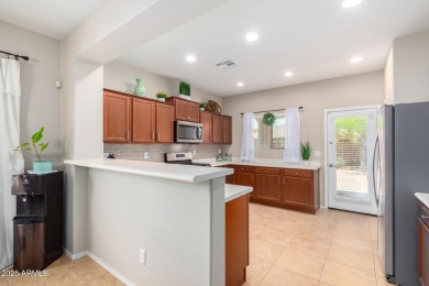 This Raven model shows like a NEW HOME but w/ a HUGE paver patio on Poston Butte Golf Club in Arizona - for sale on GolfHomes.com, golf home, golf lot