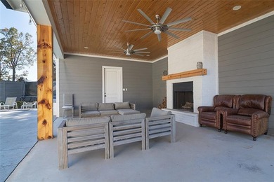 Welcome home to this beautiful modern farmhouse in the on Southern Trace Country Club in Louisiana - for sale on GolfHomes.com, golf home, golf lot