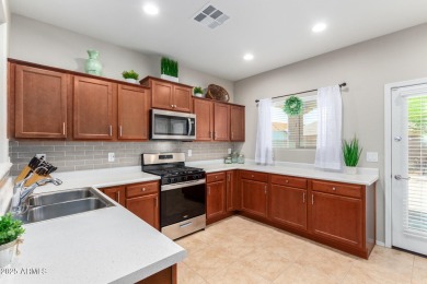 This Raven model shows like a NEW HOME but w/ a HUGE paver patio on Poston Butte Golf Club in Arizona - for sale on GolfHomes.com, golf home, golf lot